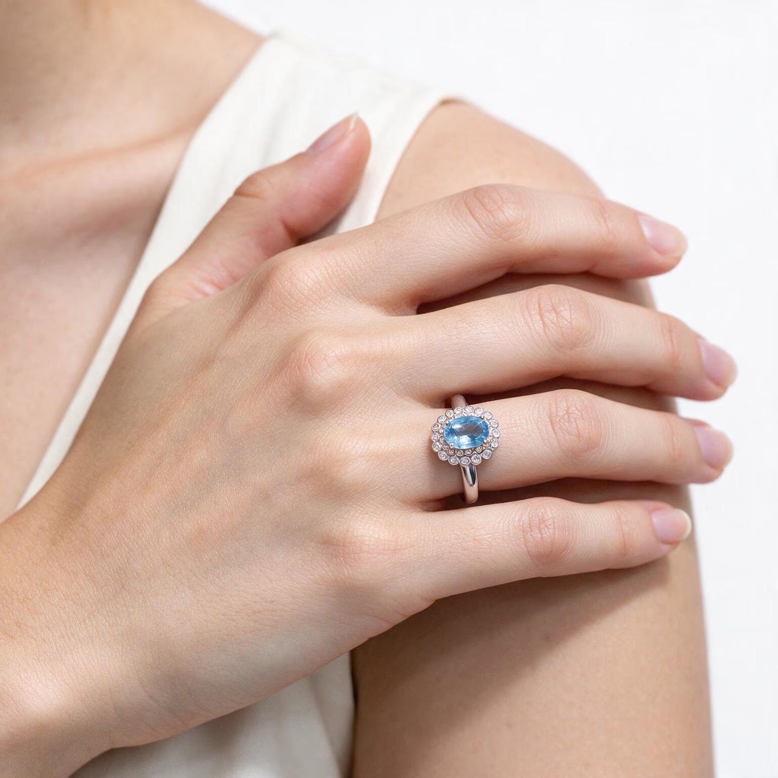 Azure Halo Blue Topaz Ring