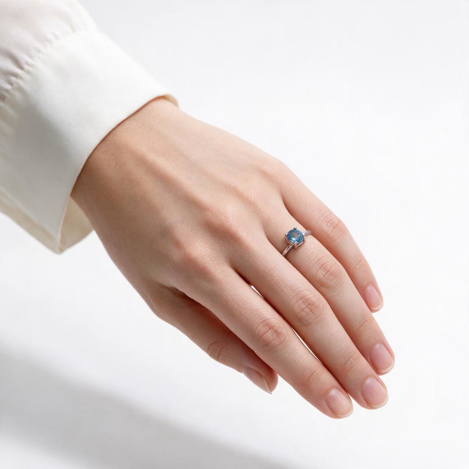 Ocean Solitaire Blue Topaz Ring